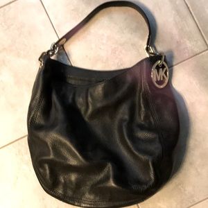 Black leather Michael Kors handbag.